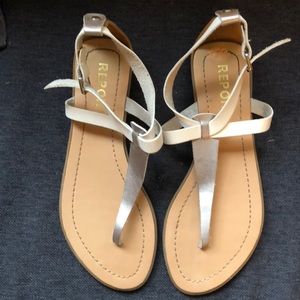 Report silver and white strappy thong sandals
